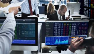 Προσπάθειες ανόδου στην Wall Street, εν μέσω μπαράζ αποτελεσμάτων