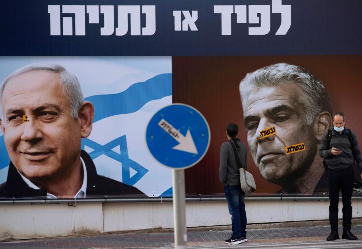 Prime Minister Benjamin Netanyahu, left, and opposition party leader Yair Lapid, in Ramat Gan, Israel