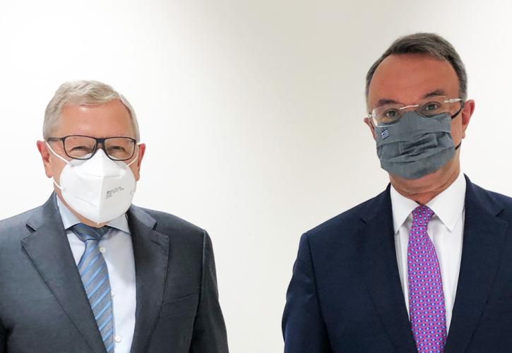Ο Κλάους Ρέγκλινγκ και ο Χρήστος Σταϊκούρας