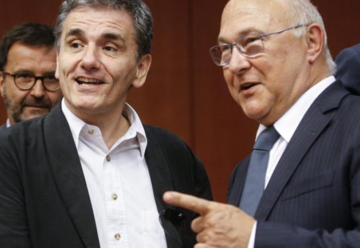 Sapin: Αναζητείται λύση στο τρίγωνο «ΔΝΤ - Γερμανία - Ελλάδα»