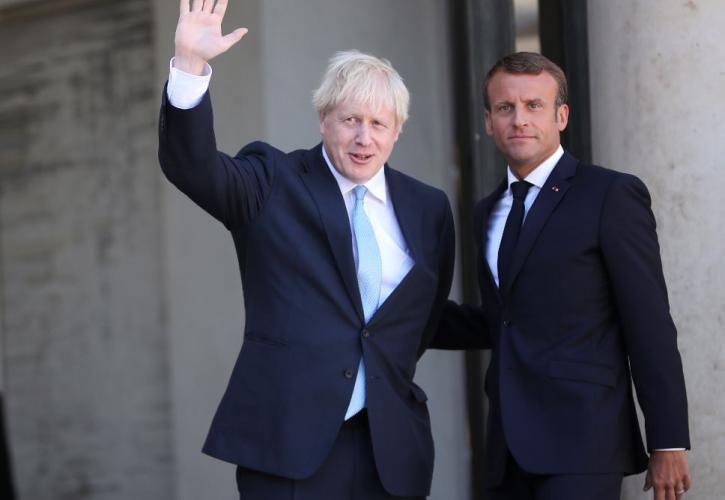 Μακρόν σε Τζόνσον: Να ξεκινήσουν τάχιστα οι συνομιλίες με την ΕΕ για το Brexit