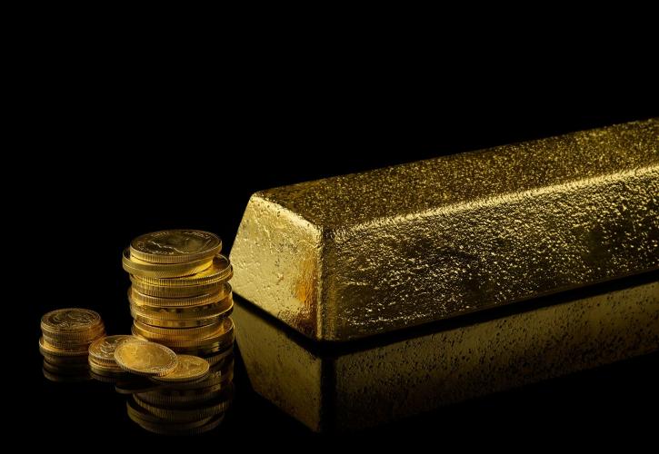 «Βουτιά» για τον χρυσό - «Ράλι» στη Wall Street